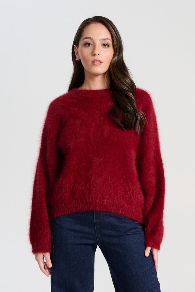Olga de Polga angora Montreal Knit sweater in Vino red. Crafted in an impossibly soft angora blend, this jumper will keep you warm on the greyest of days while still staying comfortable and light. Front view on model
