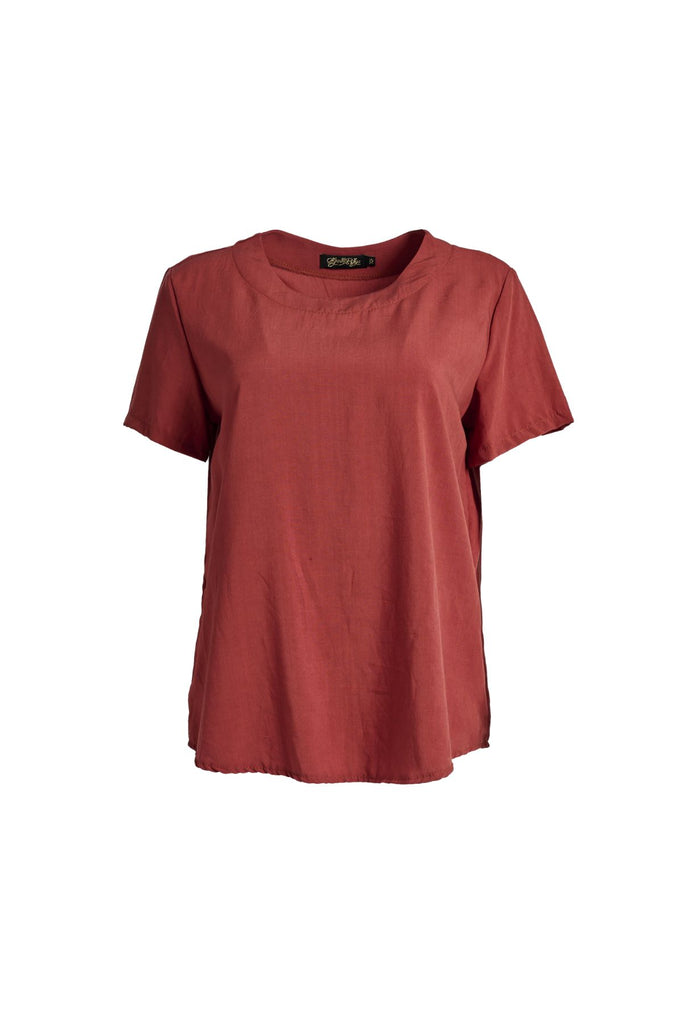 Olga de Polga Rhea Top in Rust. 100% Tencel. Round neckline and short sleeves. A boxy t-shirt shape in a soft silky Tencel fabric. Front view