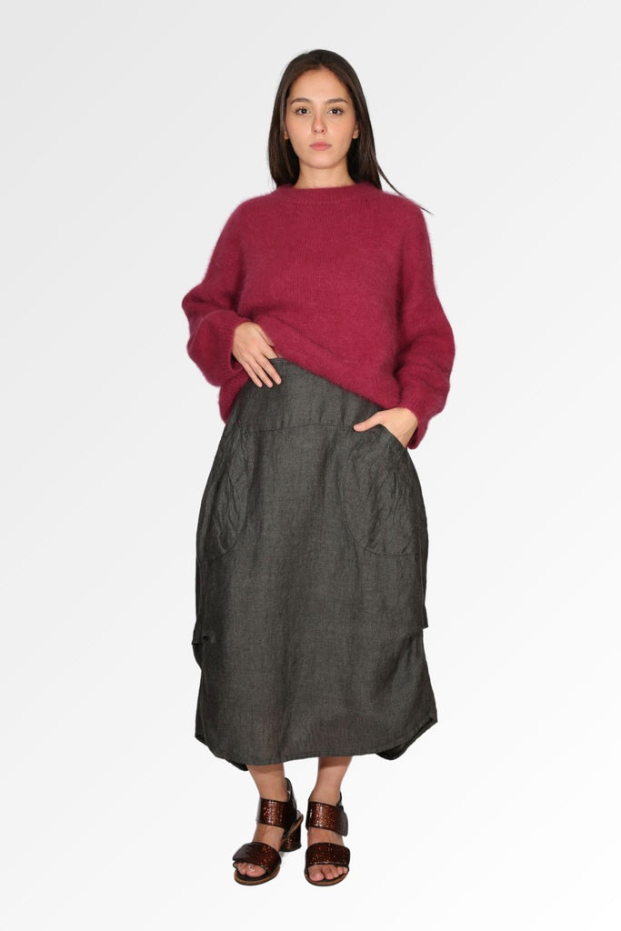 Olga de Polga Slate Milwaukee alta luxe linen skirt. Front indoor view on model