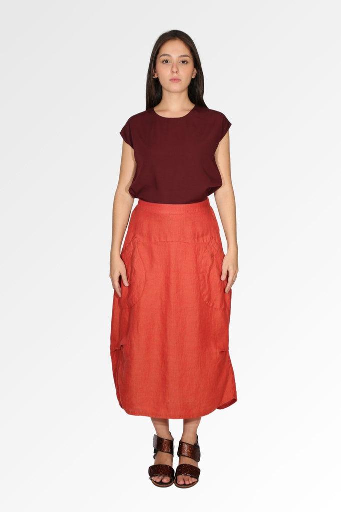 Olga de Polga Milwaukee skirt in Tamarillo red luxe linen. Front view