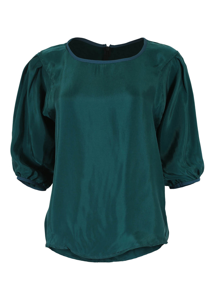 Olga de Polga classic blouse in Teal Bordeaux Cupro Twill, with a round neckline and half sleeves, this blouse finishes at the hip.  Front view