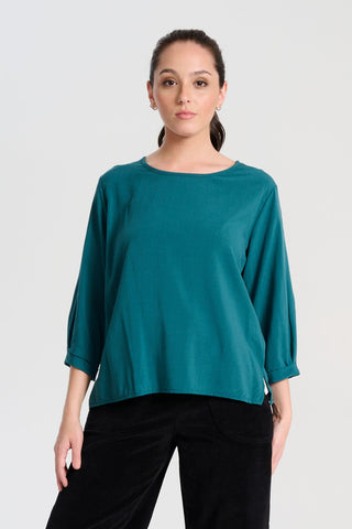 Olga de Polga Teal Rhea Chemise Blouse in 100% fine Tencel. Front view on model