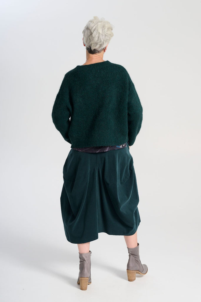 Olga de Polga Teal Milwaukee Marlowe cord skirt in 100% cotton. Comfy waistband making it the perfect throw-on-and-go! Back view on model