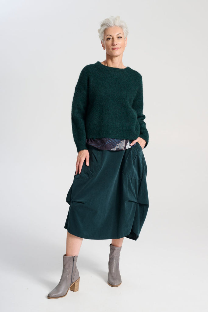 Olga de Polga Teal Milwaukee Marlowe cord skirt in 100% cotton. Comfy waistband making it the perfect throw-on-and-go! Front view on model