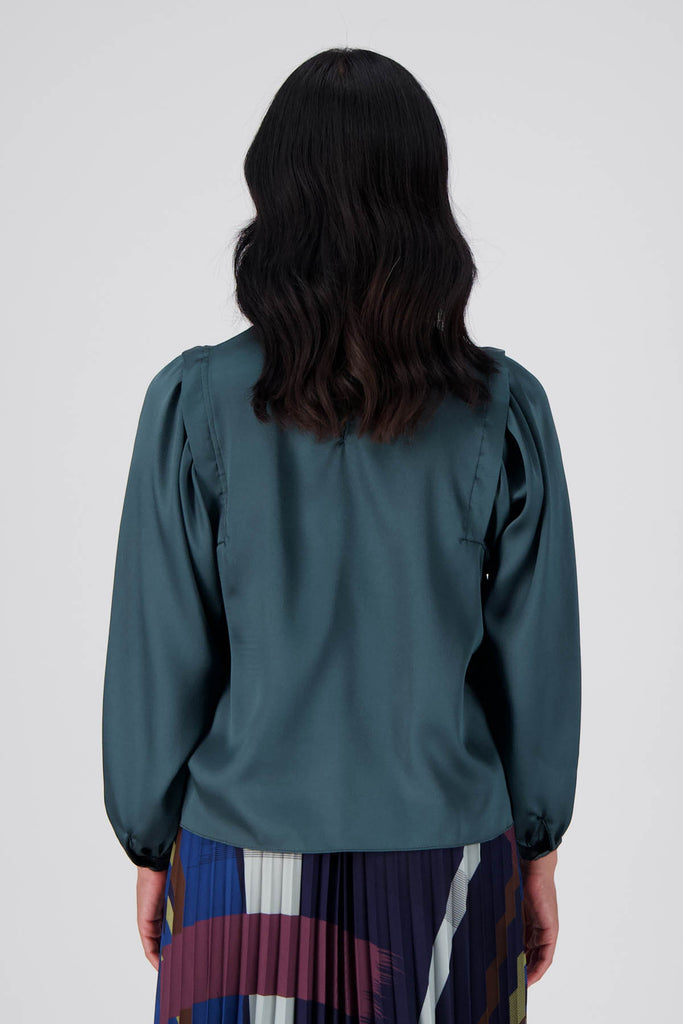 Olga de Polga Teal Monnshine Blouse in satin viscose. With billowing sleeves and a high neckline, this is a perfect date night go-to.  Back view