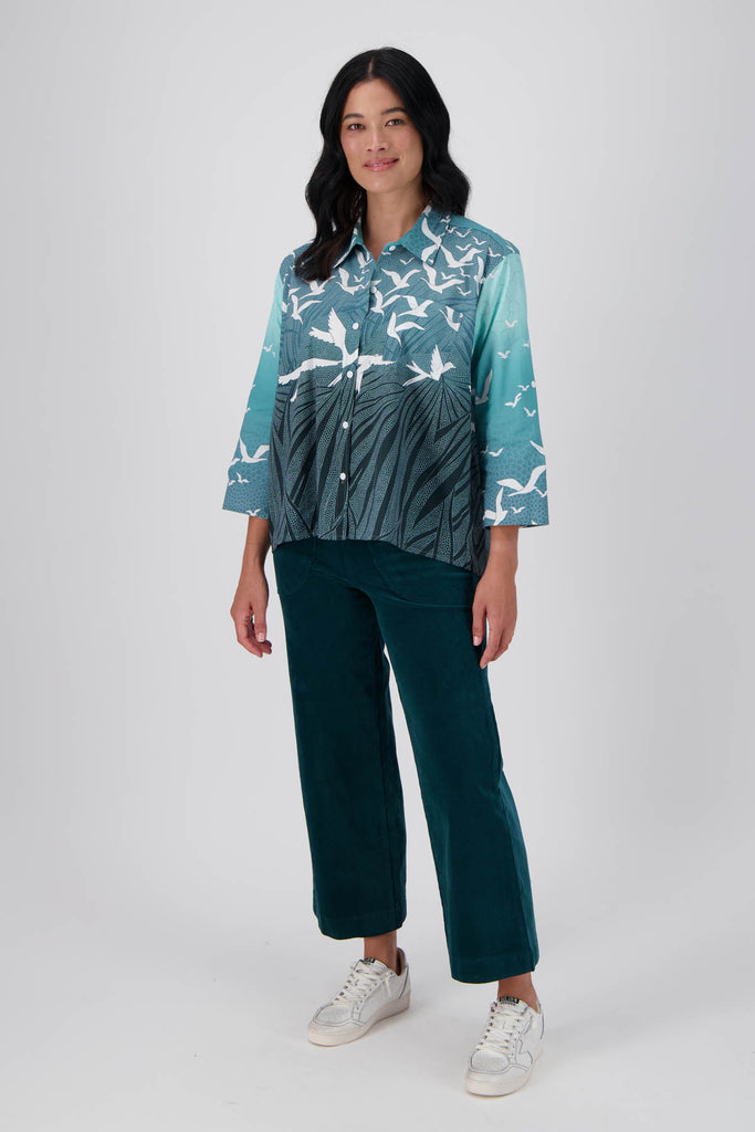 Olga de Polga Peggy Cord Pants in Teal. Front image, shown with Green printed skirt. 