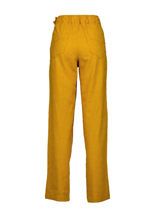 Olga de Polga Peggy Pants Long Lino in linen. Featuring a flattering high waist with an elasticated back, these pants provide all-day comfort while maintaining a sleek, streamlined look. With their stretchy wide-leg fit, flat front, and full-length silhouette, they effortlessly elevate any outfit. Back view.