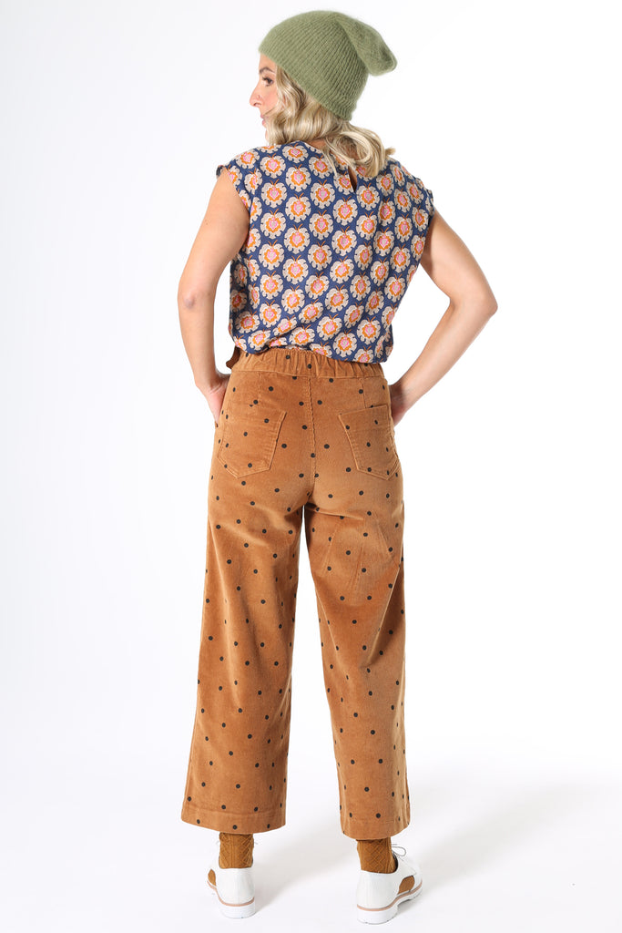 Olga de Polga Peggy Cord Caramel spot, Featuring detailed pockets, high waist and wide-leg cut, the Peggy Cords are a cropped ankle style designed to show off your favourite boots and shoes. The cord gives the style a more textured look with a heavier drape. They are super comfortable with moderate stretch and an elasticised back waist.