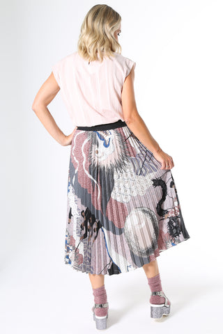 Olga de Polga Pleated skirt. An elegant, classic fully pleated design with a flattering high waist and elasticated waistband for maximum comfort. Inspired by ancient Japanese art, the festival print represents a celebration of the new year. This season we've created a new version in a colour palette of musk, dusty blue, cobalt and plum. Silky fabric with a floaty drape.  