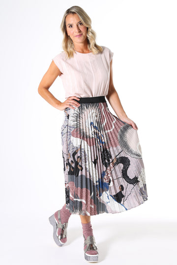 Olga de Polga Pleated skirt. An elegant, classic fully pleated design with a flattering high waist and elasticated waistband for maximum comfort. Inspired by ancient Japanese art, the festival print represents a celebration of the new year. This season we've created a new version in a colour palette of musk, dusty blue, cobalt and plum. Silky fabric with a floaty drape.  