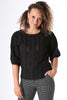 Woman wearing Black stripe blouse 