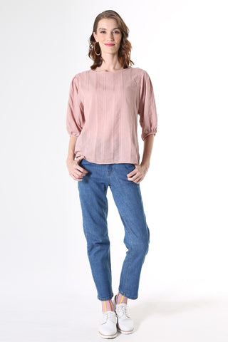 Olga de Polga Blouse in Avenida Textured cotton pink musk. the blouse features a beautifully detailed lantern sleeve with a drop shoulder and delicate pleating on the shoulder and cuff. It also has a wide boat neckline and invisible zip fastening at the back.