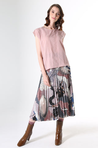 Olga de Polga Avenida Textured cotton Tee in Pink Musk.Fine, floaty cotton/rayon with flattering vertical stripes of grosgrain ribbon and textured detail. Matched with the stretchy printed festival pleated skirt.