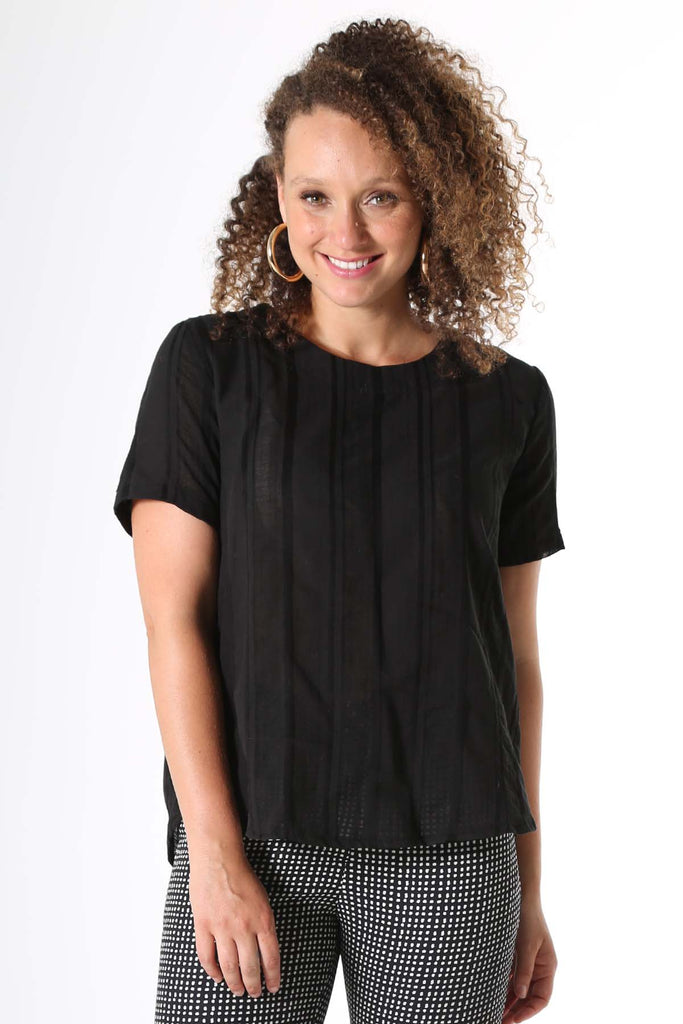 Woman wearing black cotton stripe top 