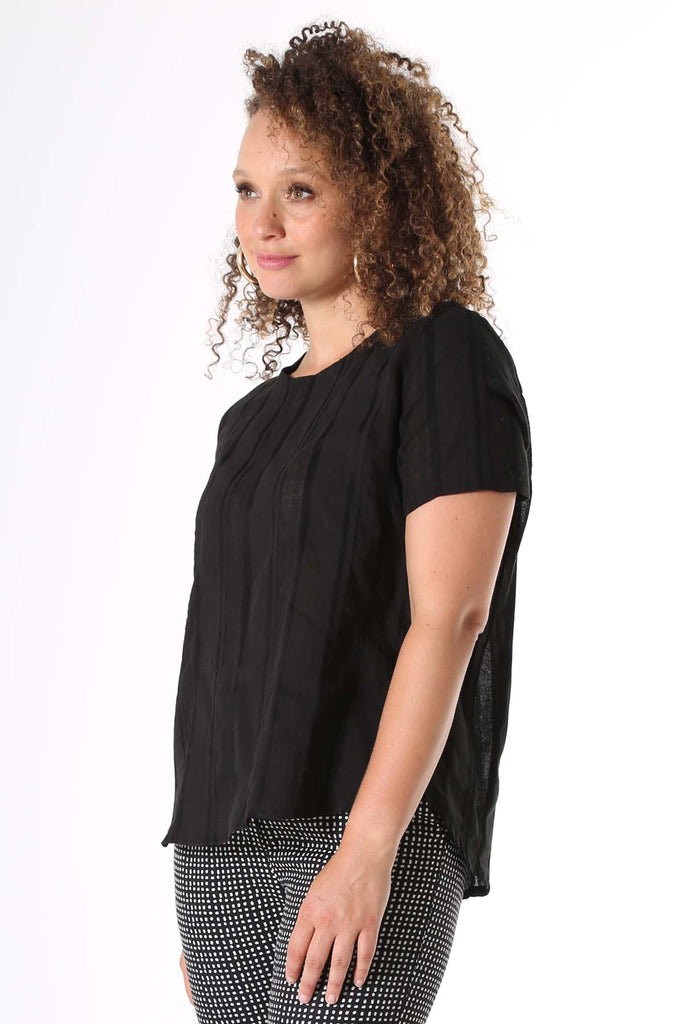 Woman wearing black cotton stripe top 