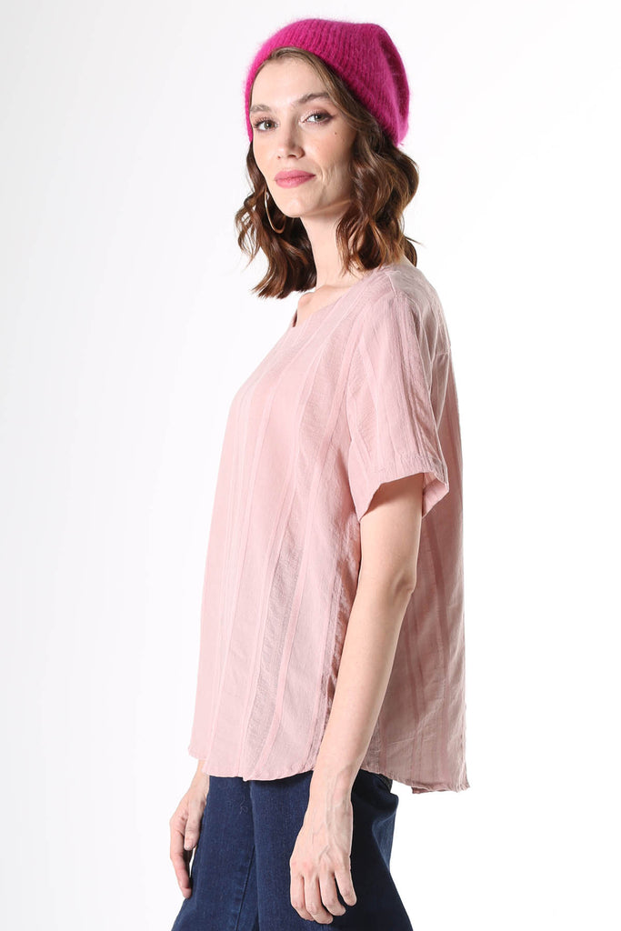 Olga de Polga Avenida Top in pink musk. Fine, floaty cotton/rayon with flattering vertical stripes of grosgrain ribbon and textured detail. Worn with the Peta denim, button-up jeans, dark denim, and the pink soft angora beanie.