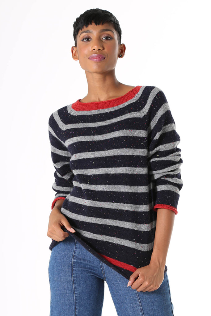 Olga de Polga Byron Bay Striped Sweater Navy. Made from a high quality, vintage style wool, the Byron Bay sweater feels like an old favourite. Slim straight cut with a raglan sleeve and round neck, falls below the hip. 