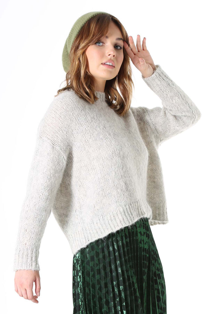 Olga de Polga Marshmallow Alpaca Sweater Storm Grey. A beautifully textured relaxed fit knit, slightly cropped length, with a drop sleeve and round neck. Perfect with mid and high-waisted jeans and skirts.