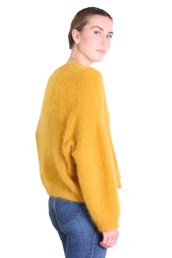 Olga de Polga montreal angora knit in mustard colour.  side view