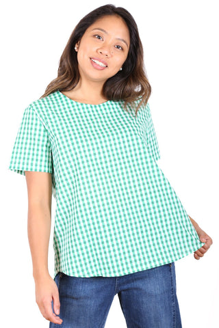 Olga de Polga green checkered short sleeved top in cotton. Front view on model
