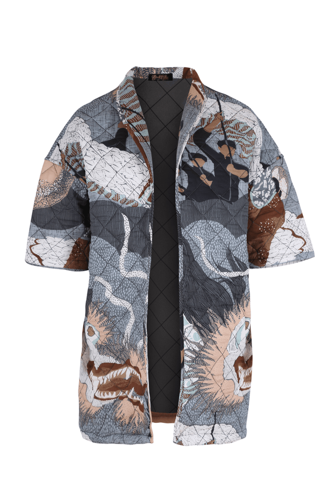 Short sleeved quilted jacket.Designed to evoke an air of effortless & evergreen style, the Festival quilted jacket in Caramel.  This print is versatile enough to take you from day to night with ease in this new version of our much loved Festival Print. Front.