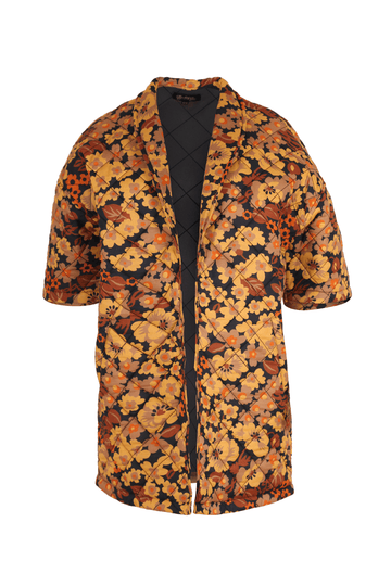 Quilted Dilon jacket. Designed to evoke an air of effortless & evergreen style, Dilon is inspired by dandelions that represent the return of life. The bright pops of orange & yellow, injects life into your wardrobe. Versatile enough to take you from day to night with ease.  Front view.
