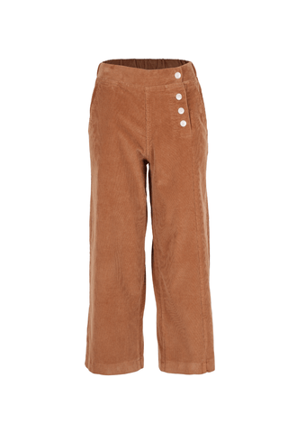 Our Betsy style features unique button detailing on the side to give our classic Peggy cords a twist.  The cord gives the style a more tactile appearance and adds an architectural element with the texture and heavier drape. Super comfortable with moderate stretch and an elasticised back.  Elastic high waistband at the back, flat front and wide-leg cut. front view.
