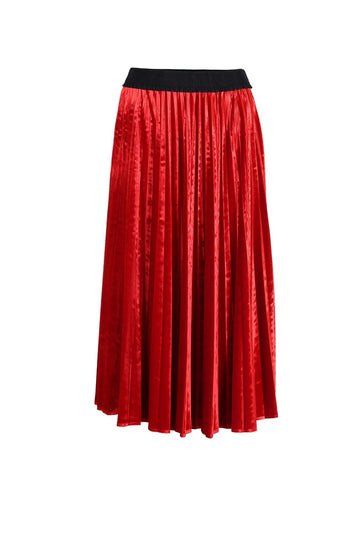 Olga de Polga new Mirage pleated skirt in soft red velvet, with a black elastic waistband. Front view.