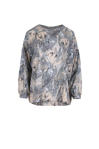 With its oversized, beautifully draped cut, our classic Suzanna Tops are both stylish and effortless. The Suzanna features dropped sleeves that are slightly gathered with a buttoned cuff. The back also has button detailing down the centre. This roomy box-cut design is perfect for leaving loose over jeans or tucking into a skirt. front view.