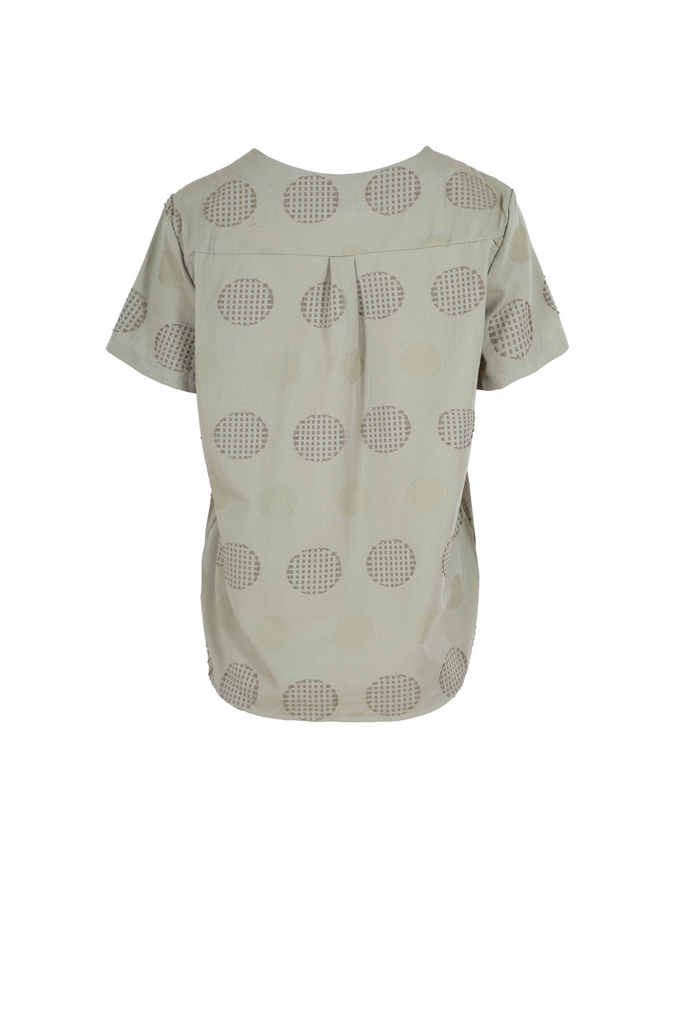 Olga de Polga top in Universal colour khaki. The top is straight cut, with a short sleeve, crew neck and a box pleat at the back to give it more fullness and movement. back view