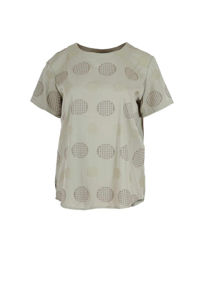 Olga de Polga top in Universal colour khaki. The top is straight cut, with a short sleeve, crew neck and a box pleat at the back to give it more fullness and movement. Front view